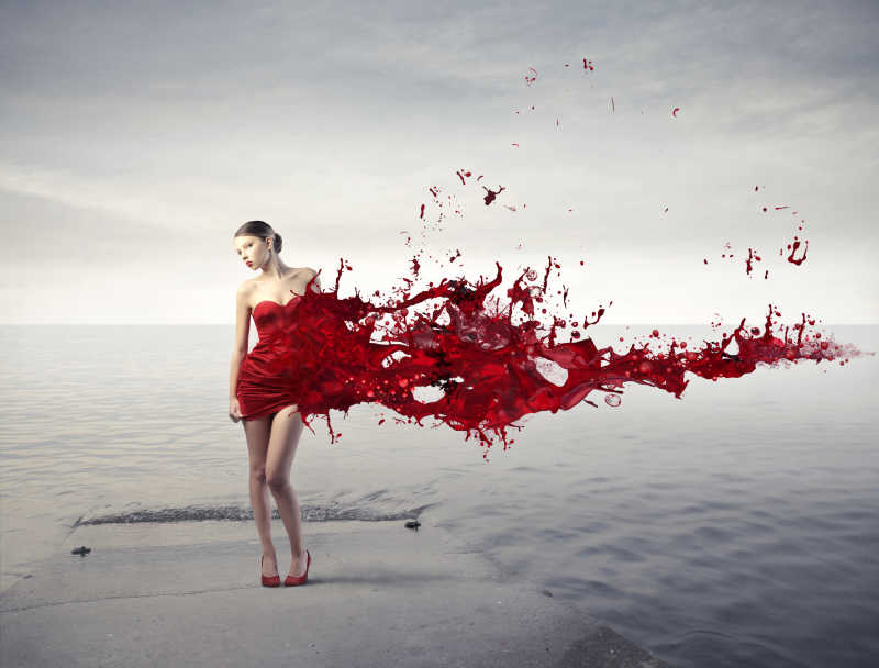 码头上女人的红色衣服融化成油漆