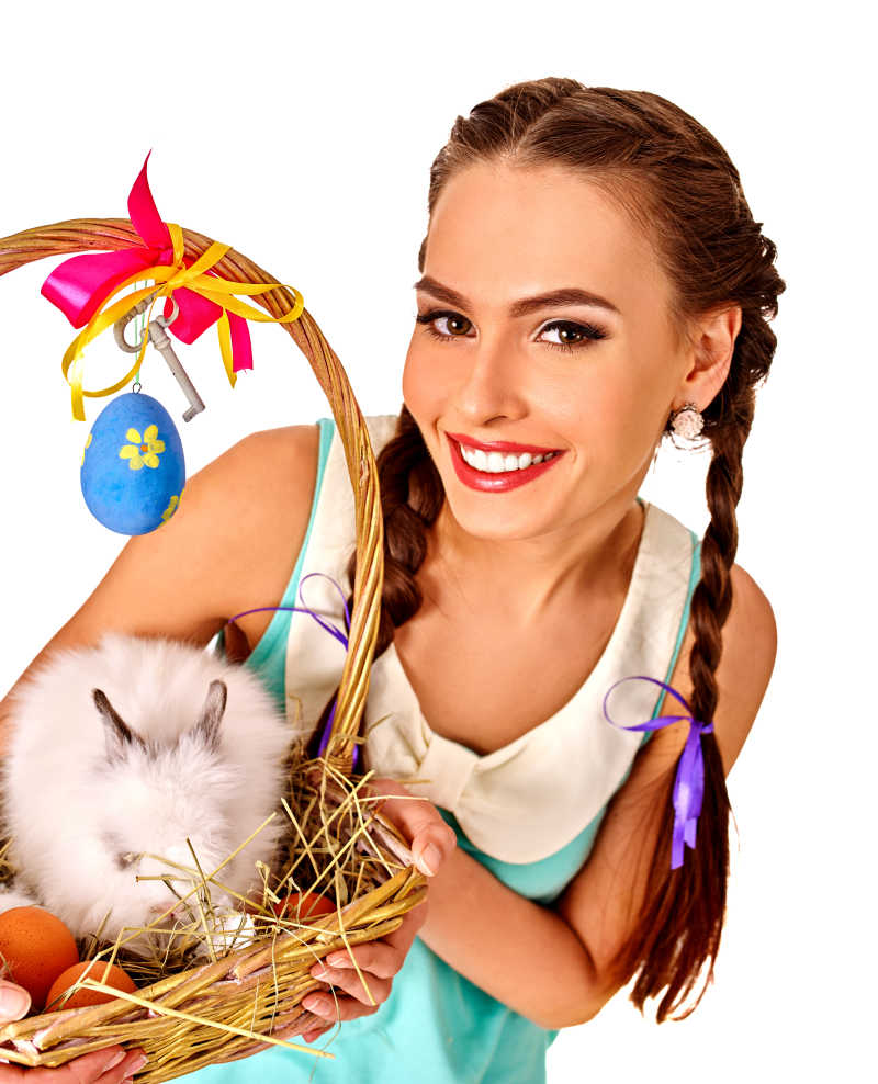 复活节装扮的女孩和兔子