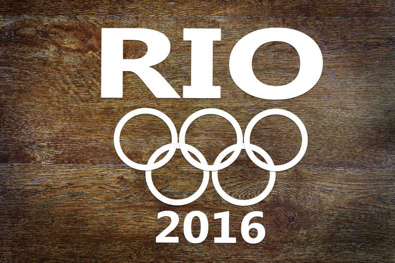 木制背景下的里约热内卢奥运会剪纸