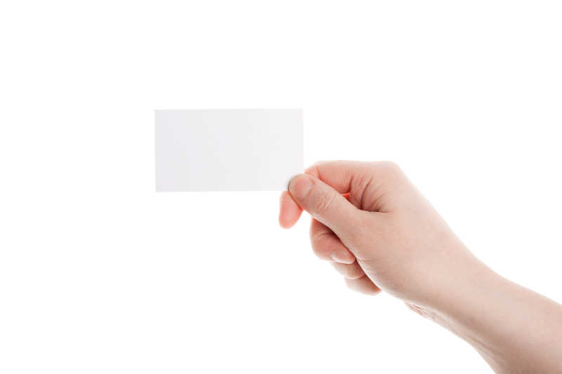手拿一张长方形白色纸片