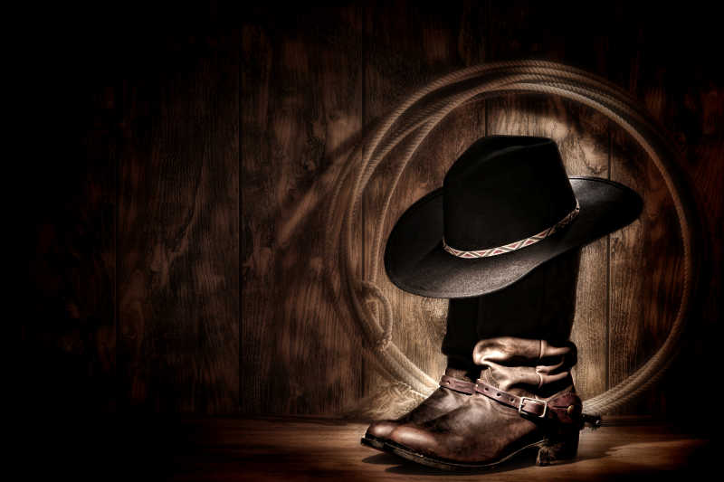 美国西部牛仔乌毡帽和皮革靴子