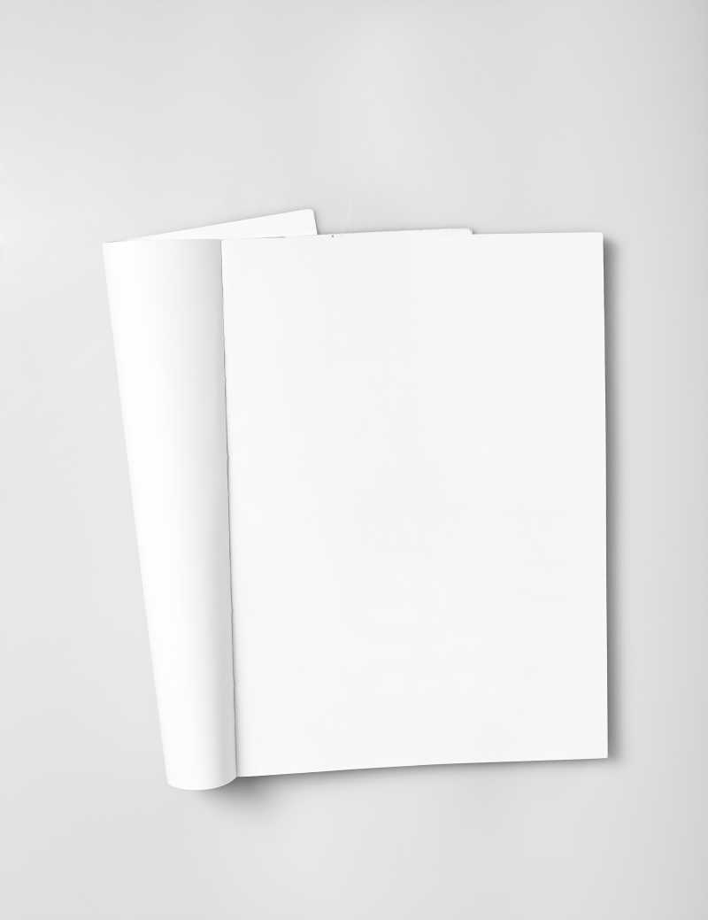 灰白色背景下打开的空白日记本