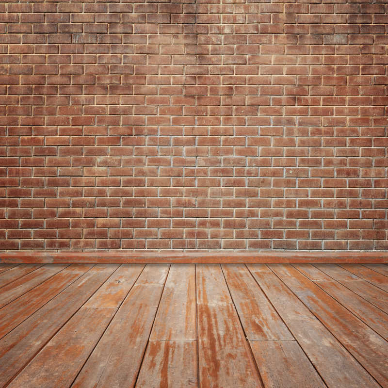 木地板和砖墙相连接背景