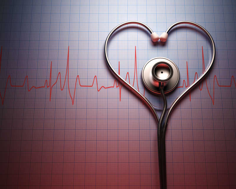 心电图背景上的心形听诊器