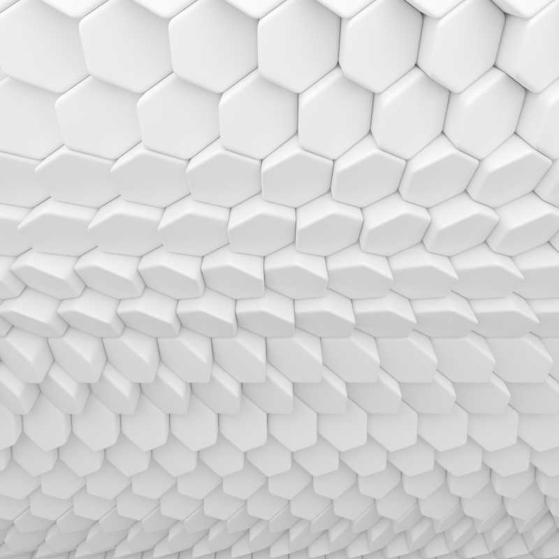 瓷砖墙上凸起的白色抽象六边形