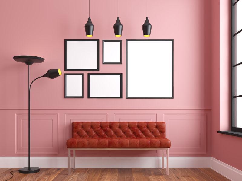 粉色墙壁上的空白相框