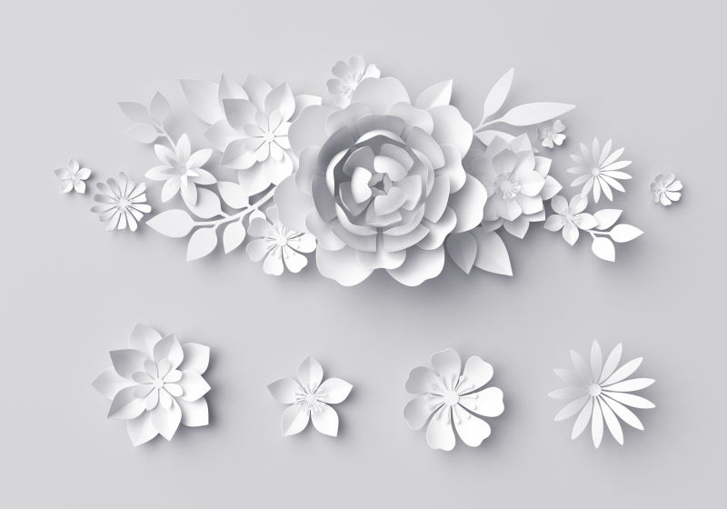 白色背景前形状不一的手剪花