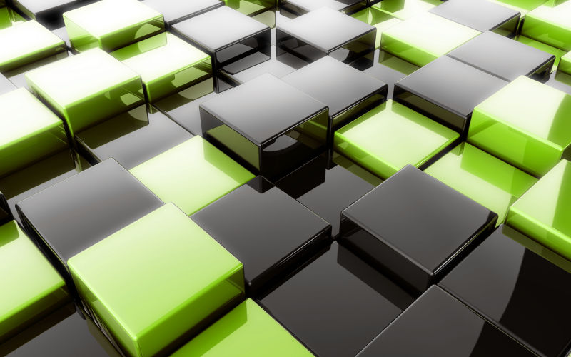 堆叠一起的绿色黑色立方体
