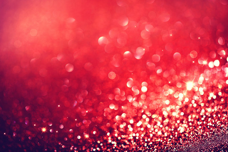 圣诞节背景-红色假日发光的抽象闪光离焦背景闪烁的星星-模糊的博克
