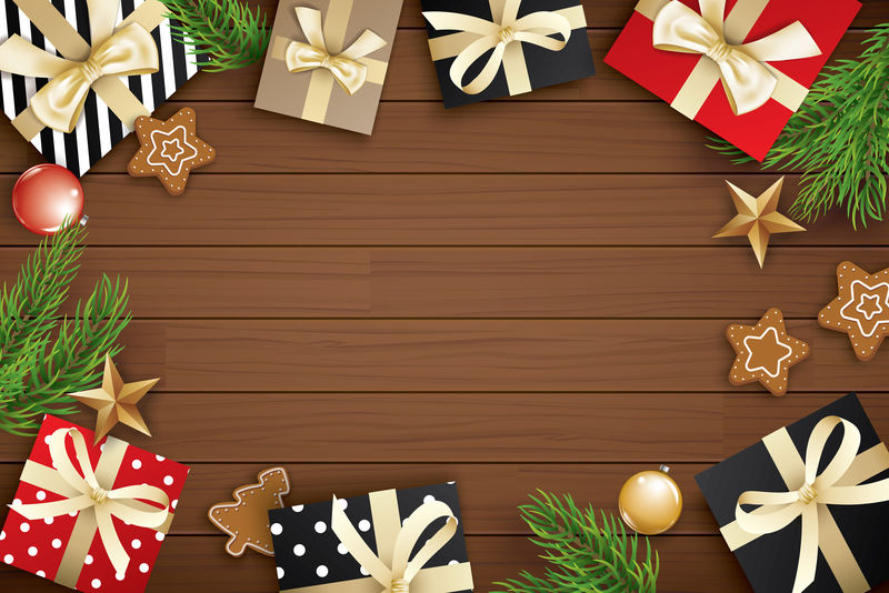 褐色木质背景上带文字复制空间的圣诞节框架