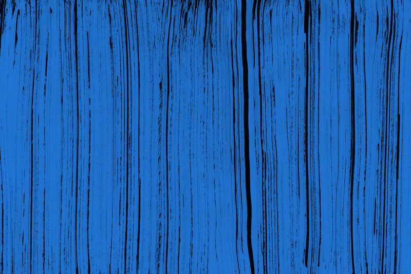 黑色纸张背景上的蓝色墨水和水彩纹理-干刷笔划效果