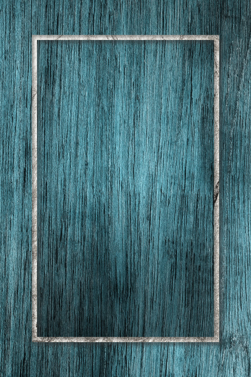 蓝色木质纹理背景上的矩形框架