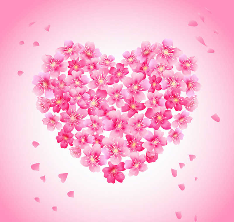 粉色小花形成的爱心形状矢量图