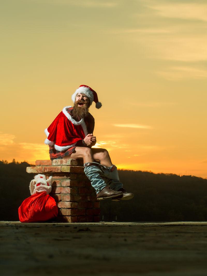 坐在烟囱上的圣诞老人